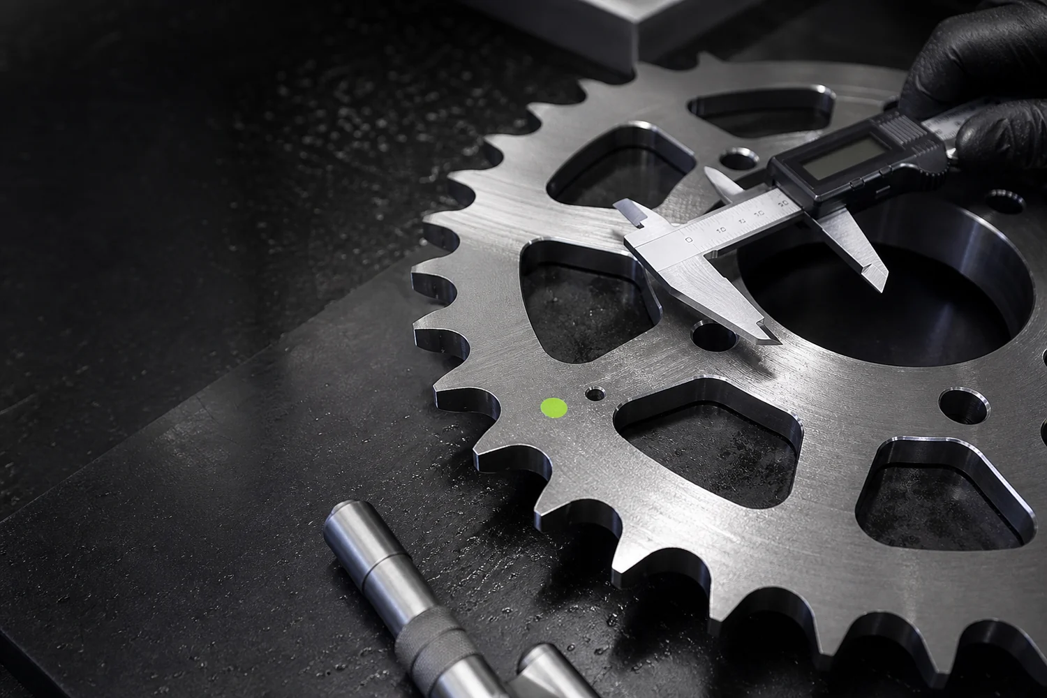 CNC machined sprocket inspection with digital caliper